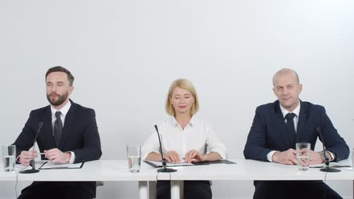Formal Press Conference with Three People