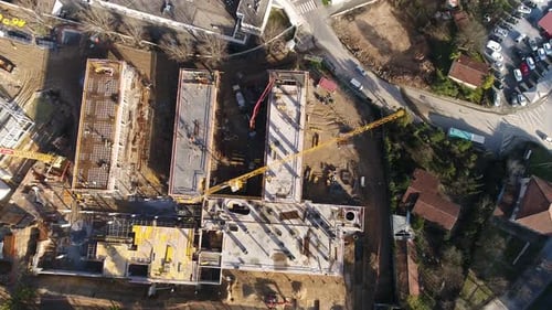 Cranes and Building Construction Site