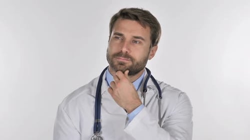 Thoughtful Doctor Stroking Beard in Deep Contemplation