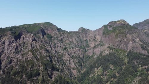 Aerial drone view of mountains on a sunny day
