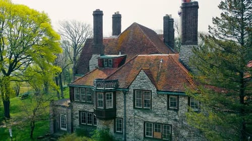 Aerial View of a Large Stone Building in Spring
