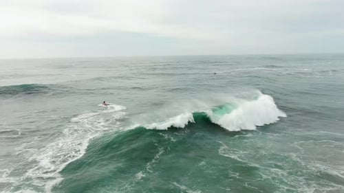 Speedboat Sails at High Ocean Waves Aerial Slow Motion