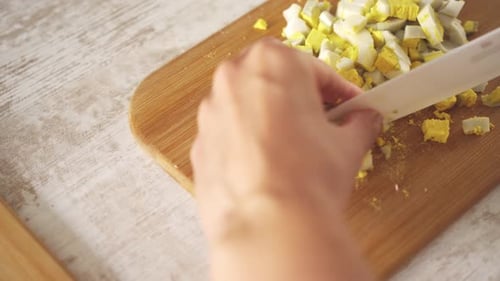 Close Up Cutting Hard Boiled Eggs