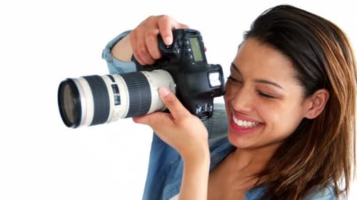 Smiling Woman Holding Large Camera