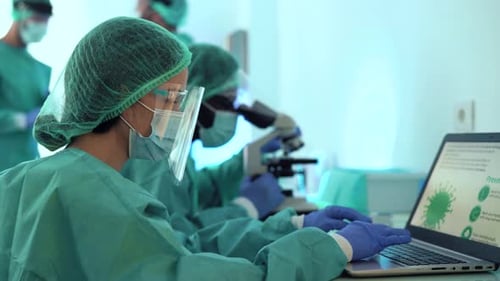 Scientists Work in Bright Medical Research Laboratory