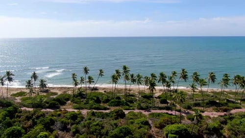 Aerial View of Tropical White Sand Beach and Turquoise Clear Sea Water with Small Waves
