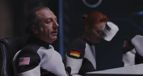 People Wearing Suits Talking and Juggling Can