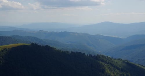 Green Mountains and Forest Landscape During Daytime