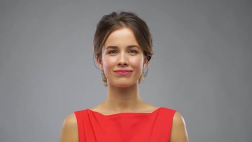 Portrait of Beautiful Young Woman in Red Dress