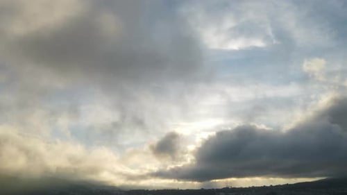 Aerial View of Moving Clouds at Sunrise