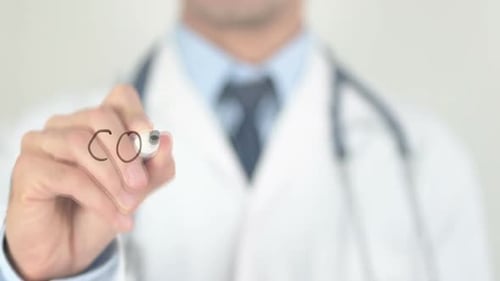 Doctor Writes Coronavirus on Clear Surface
