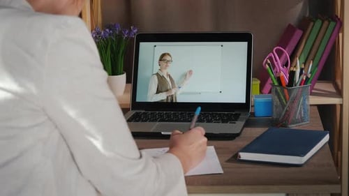 Female Student Studies at Home Near Laptop University Online Concept