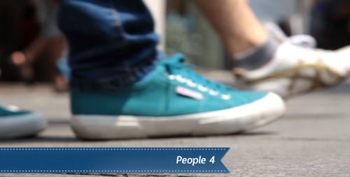 Busy Feet Walking on a City Sidewalk