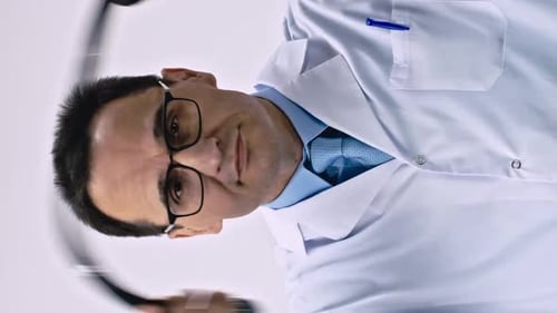Doctor Puts on Stethoscope in Vertical Video