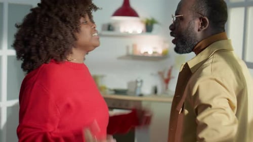 Woman Angrily Arguing with Man Indoors