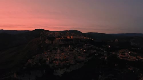 Scenic Hilltop City at Dusk Aerial