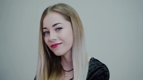 Young Blond Woman Smiling