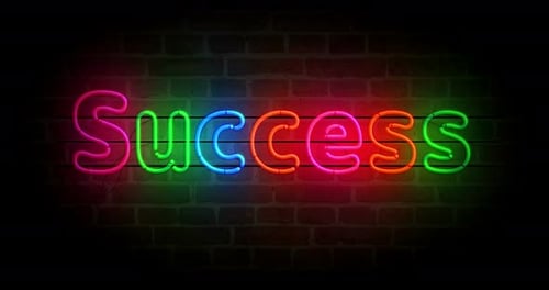 Success symbol neon on brick wall loop
