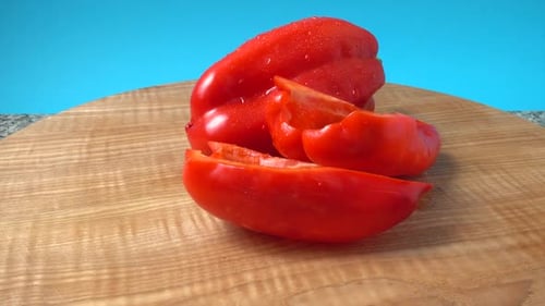 Fresh Red Bell Pepper on Cutting Board