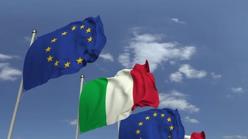 Waving Italian and European Union Flags Against Blue Sky