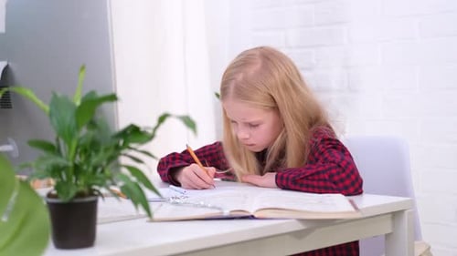 Blonde Schoolgirl Studying at Home Doing School Homework