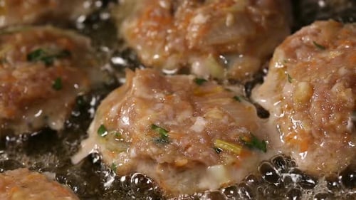 Juicy Meatballs Frying in Sizzling Hot Oil