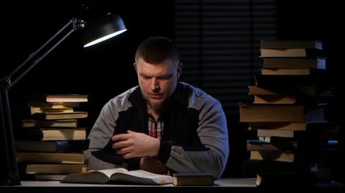 Guy with the Book Begins Very Angry, and Slowly Calmed Down. Black Background