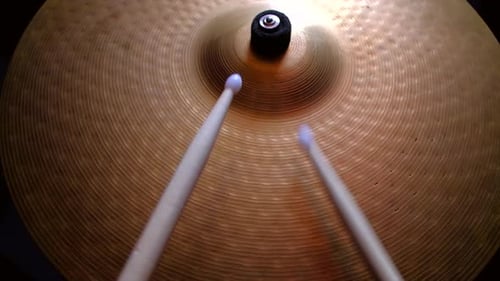 Close Up Drummer Playing on Drum Plate Ride