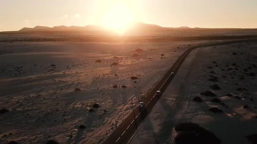 Beautiful desert and dunes view from above with sun and shadows on the sand
