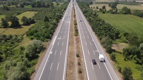 Asphalt Road with Rural Area on Both Sides