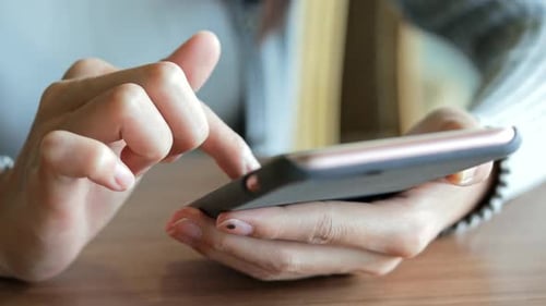 Close up of using mobile phone