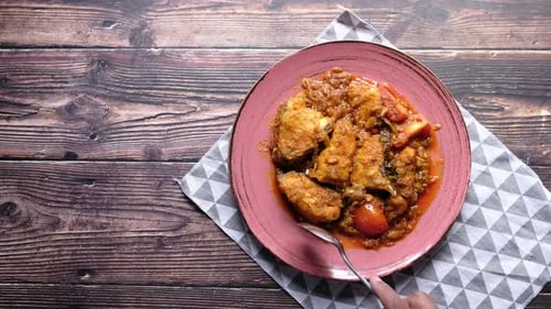 Tasty Fish Curry Meal Served on Plate