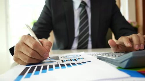 Businessman hands doing analysis planning business project in office.