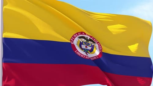 Flag of Colombia Waving in the Wind with Coat of Arms