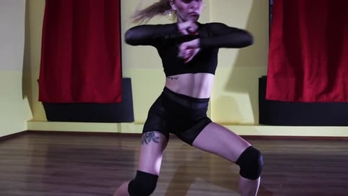 Sexy Dancing Adult Blonde Woman in Translucent Suit Dancing in Yellow Studio