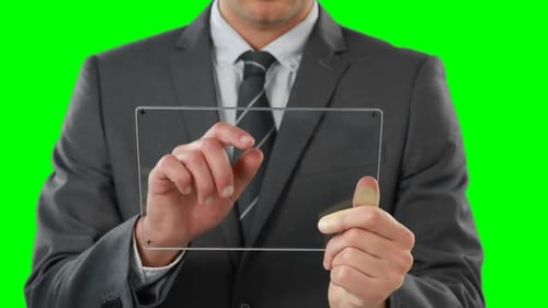 Man Interacts with Transparent Glass Tablet