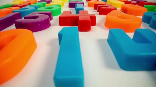 Colorful Plastic Numbers on White Background