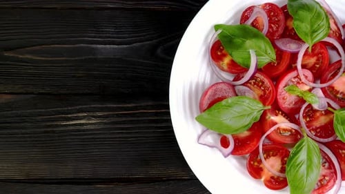 Colorful Tomato Basil Salad Overhead Close Up Shot