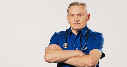 Doctor Portrait with Stethoscope Against White Background