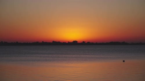 Orange blue sunset lake