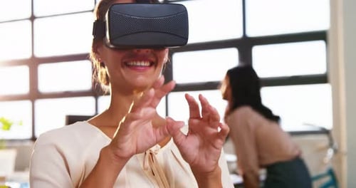 Woman Uses VR Headset in Modern Office