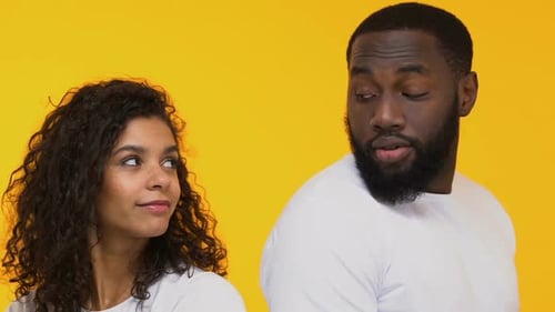 Young Couple Looking With Interest, Pondering New Acquaintance, Partner Choice