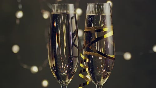 Champagne Glasses with Gold Ribbons for Celebration