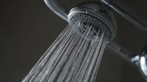 Showerhead Streams Water in Refreshing Close-up