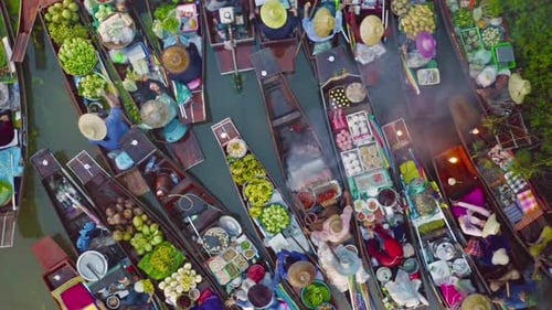 Damnoen Saduak Floating Market or Amphawa. Local people sell fruits, traditional food on boats