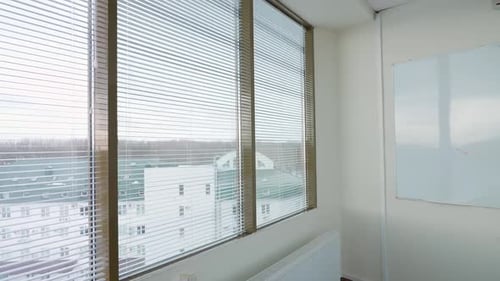 Inside a Skyscraper the Interior of an Empty Office Space with Panoramic Windows a Walk Through the