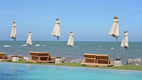 Outdoor swimming pool in hotel resort for vacation