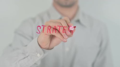 Writing Strategy With Red Marker on Clear Surface