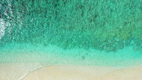 Natural above copy space shot of a summer white paradise sand beach and aqua turquoise water backgro