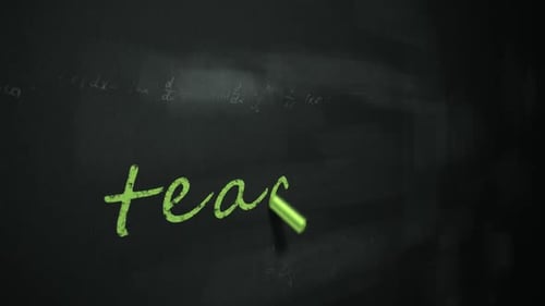 Animation of green chalk writing the English word 'teaching' on a blackboard.